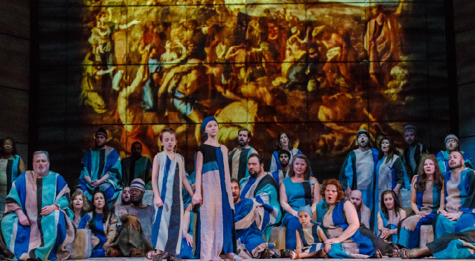 The imprisoned Israelites (Pittsburgh Opera Chorus and Supernumeraries) mourn for their homeland in the famous chorus 