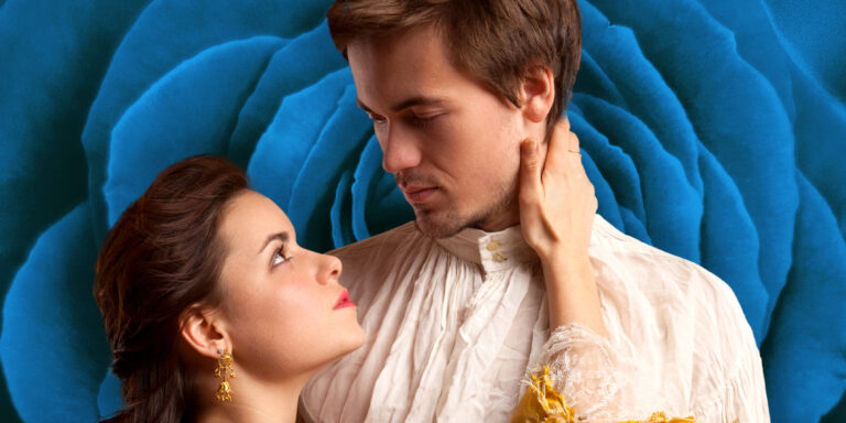 Juliet in gold brocade gazes up at Romeo in a white shirt before a giant blue rose; Romeo and Juliet hero image