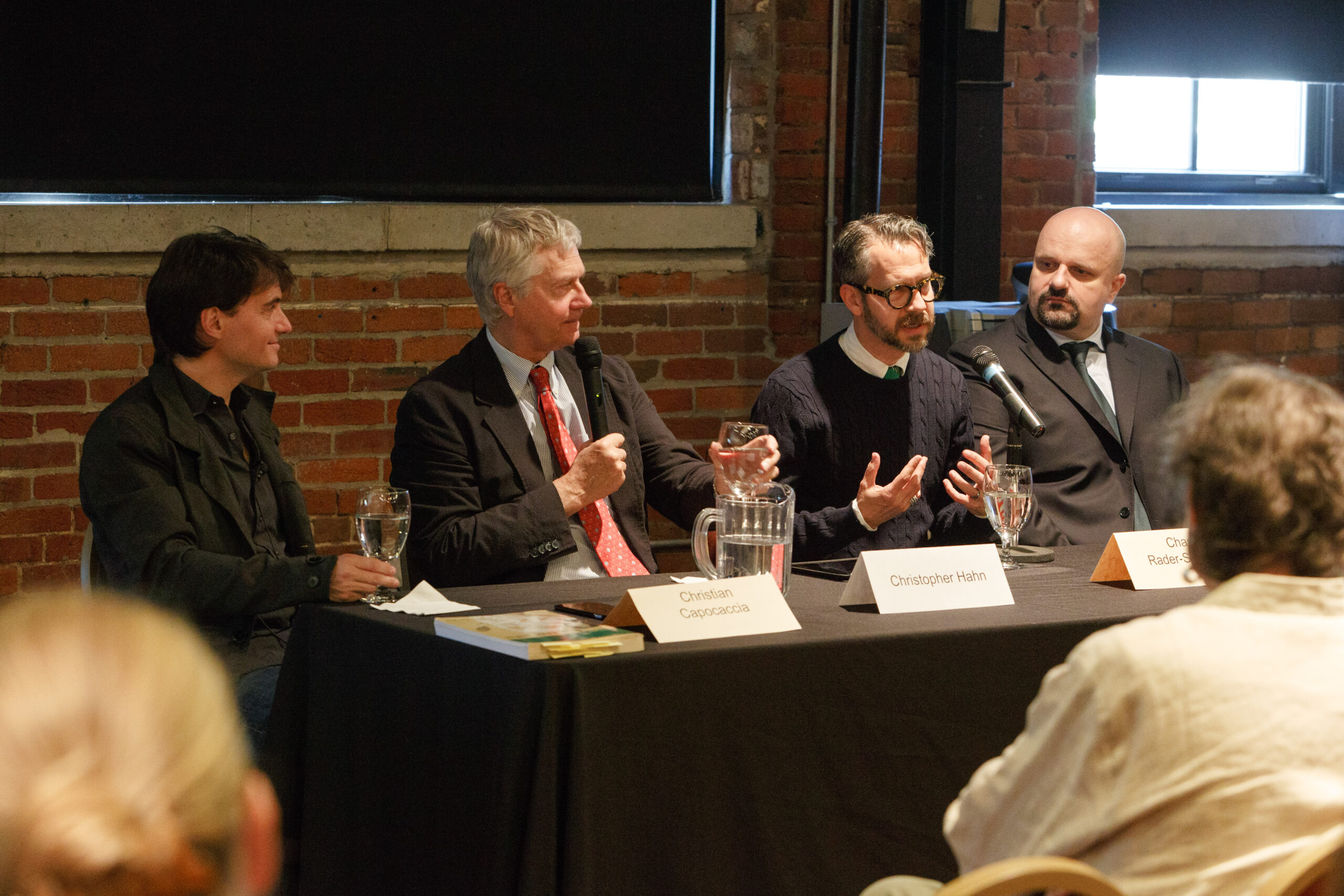 Christian Capocaccia, Christopher Hahn, Chas Rader-Shieber, and Sebastian Catana at a 2016 Opera Up Close panel table
