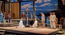 The wedding party gathers on a wooden deck before a painted seascape in Pittsburgh Opera's Madama Butterfly, 2018