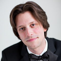 George Milosh sings the role of Mariachi Singer 1