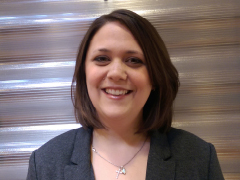 A headshot of Emily Grand