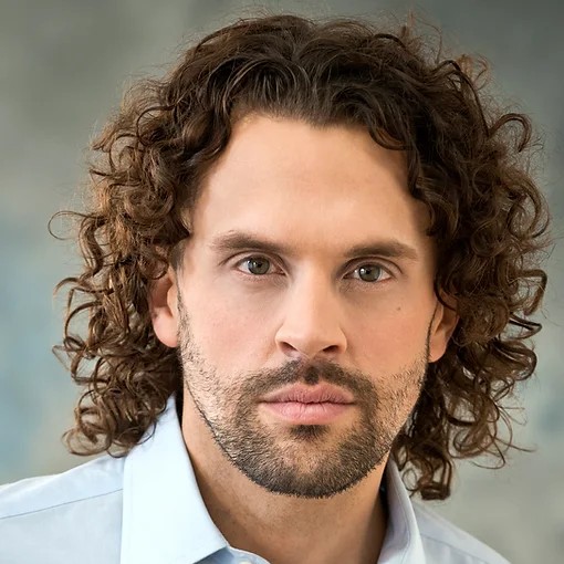 John Moore, portrait; Figaro in Pittsburgh Opera's The Barber of Seville, 2023