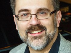 A headshot of Mark Trawka