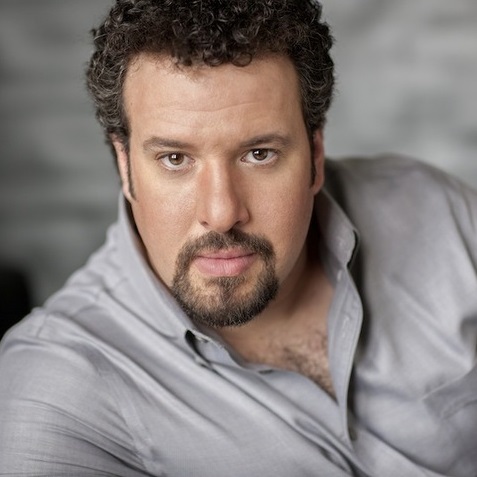 Oren Gradus, portrait; Dottore Grenvil in Pittsburgh Opera's La Traviata, 2024