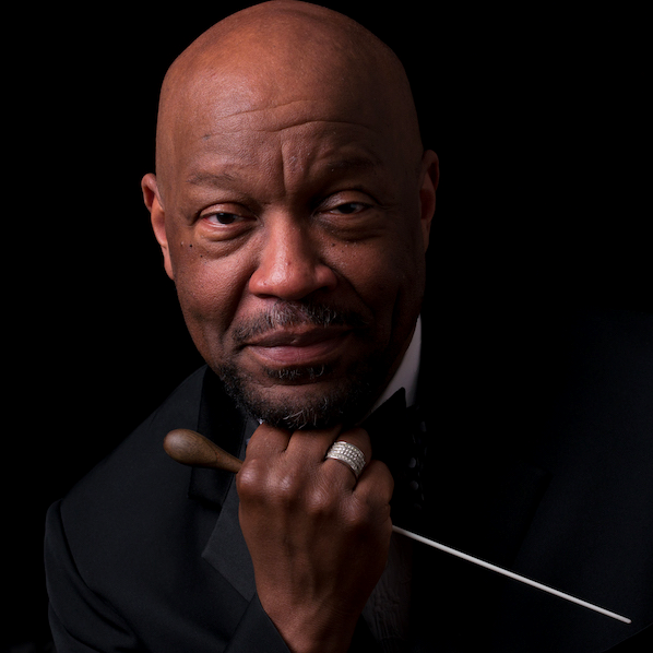 Thomas W. Douglas holding a conductor's baton, portrait